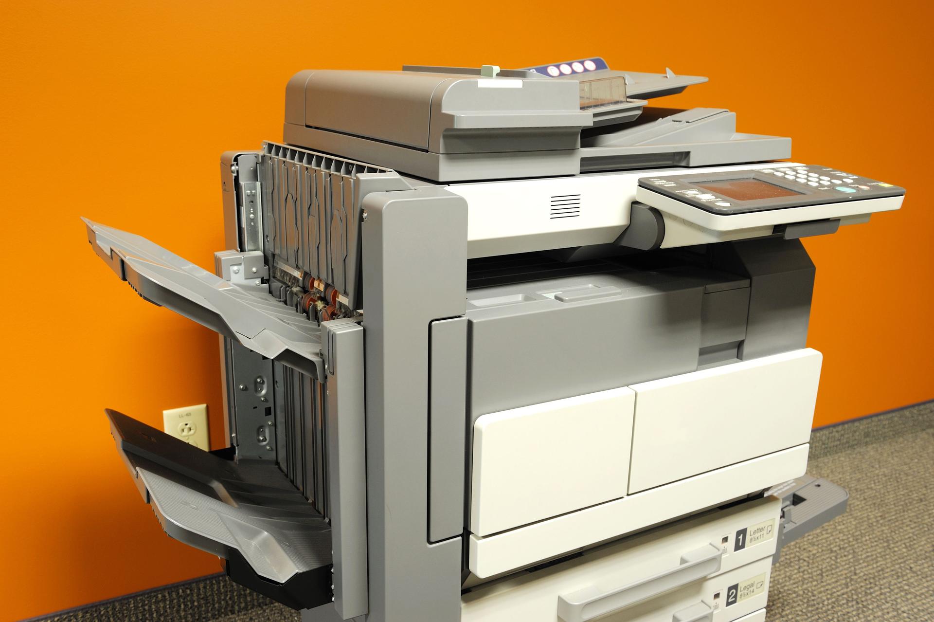 Close up on copier in office room